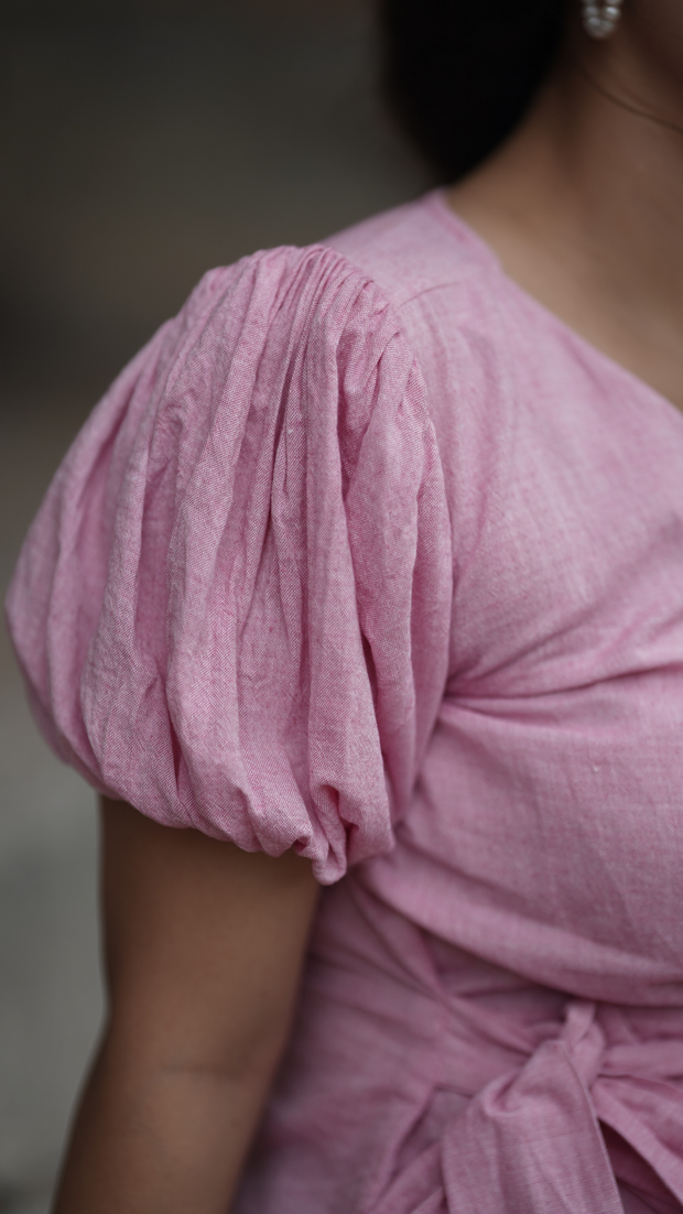 Woman wearing Etehas pure cotton lotus pink colour peplum elegant top