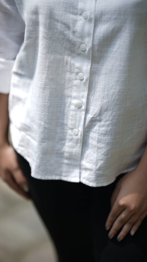 White statement cotton shirt from Etehas for women. Comfortable, stylish, sustainable & ethically made. Pair it with jeans, skirt, pant.   