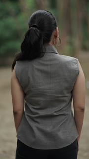 Woman wearing Etehas pure cotton grey sleeveless formal shirt  